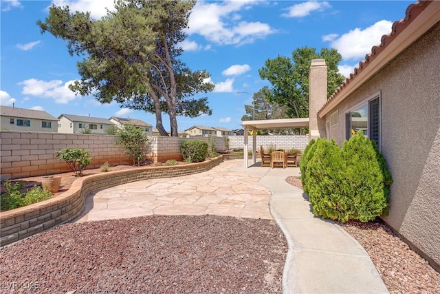 1219 Heather Oaks Way N, Las Vegas, NV 89031 - fenced backyard with a patio area and a residential view