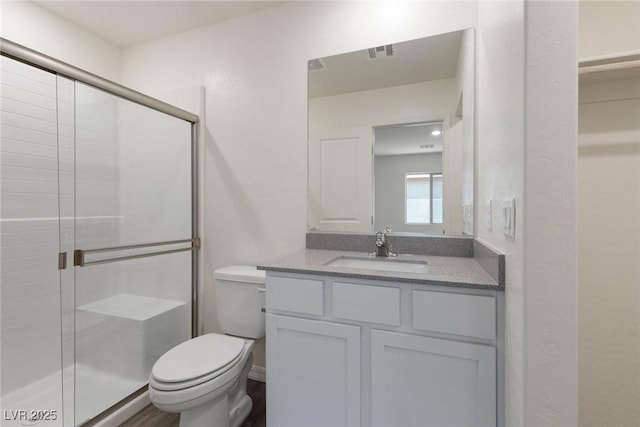 1716 Desert Path Ave, North Las Vegas, NV 89032 - full bath with toilet, a shower stall, and vanity