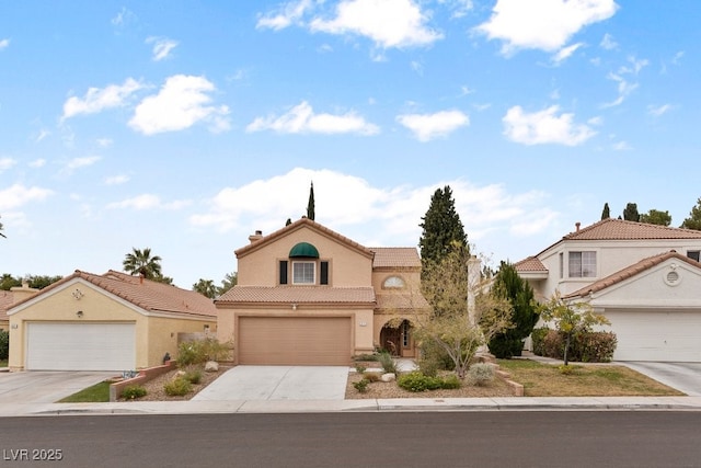 3217 Harbor Vista St, Las Vegas, NV 89117 - mediterranean / spanish house featuring stucco siding, a tile roof, and concrete driveway