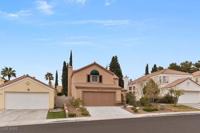3217 Harbor Vista St, Las Vegas, NV 89117 - view of front of property featuring a tile roof, a garage, and stucco siding