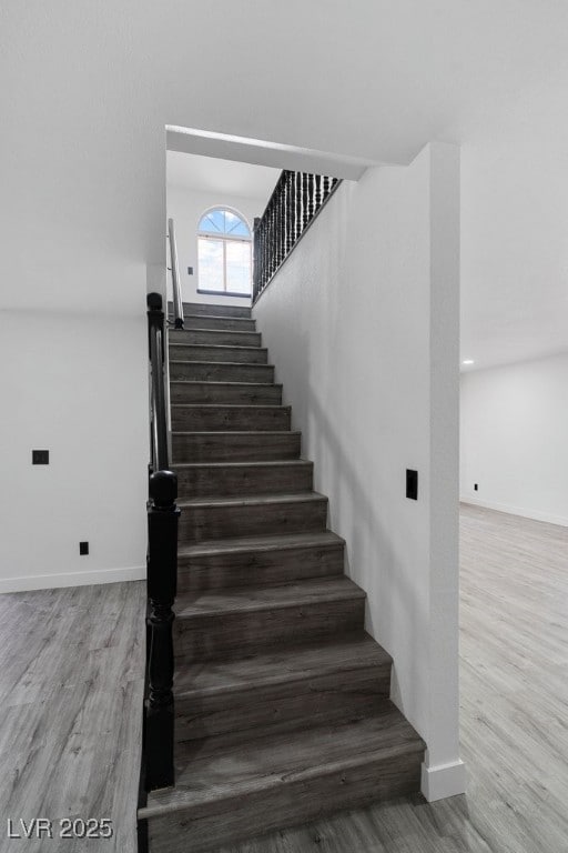 3217 Harbor Vista St, Las Vegas, NV 89117 - stairs with wood finished floors and baseboards