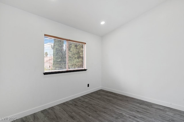 3217 Harbor Vista St, Las Vegas, NV 89117 - spare room featuring baseboards, dark wood-type flooring, and recessed lighting