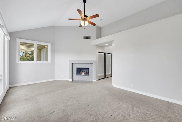 5008 Shoal Creek Cir, Las Vegas, NV 89113 - unfurnished living room with baseboards, light colored carpet, a fireplace, lofted ceiling, and a ceiling fan