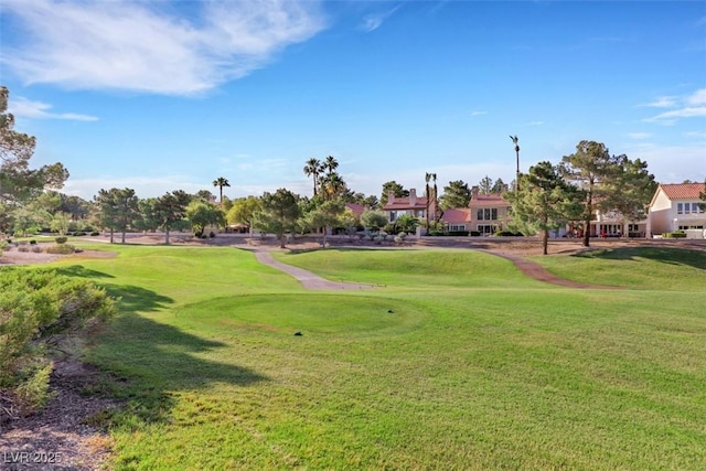 5008 Shoal Creek Cir, Las Vegas, NV 89113 - view of property's community featuring golf course view and a lawn
