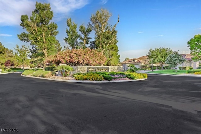 5008 Shoal Creek Cir, Las Vegas, NV 89113 - view of asphalt road featuring curbs