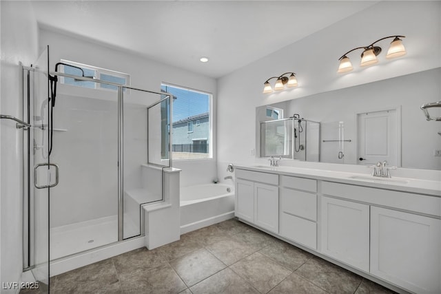 8055 Tank Loop St, Las Vegas, NV 89166 - bathroom with a shower stall, double vanity, and a bath