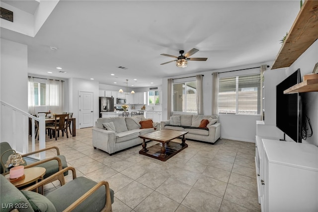 8055 Tank Loop St, Las Vegas, NV 89166 - living area with recessed lighting, light tile patterned floors, healthy amount of natural light, and ceiling fan