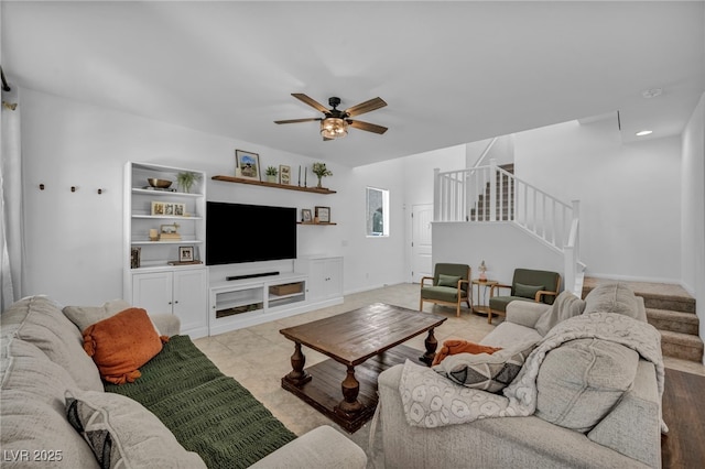 8055 Tank Loop St, Las Vegas, NV 89166 - living area featuring stairs, a ceiling fan, and baseboards