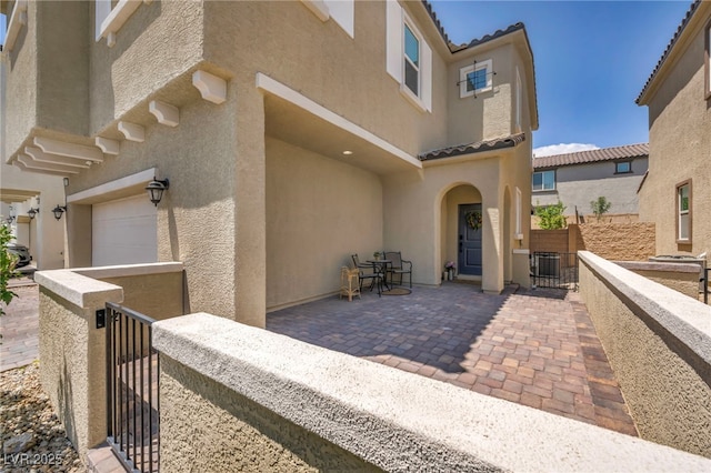8055 Tank Loop St, Las Vegas, NV 89166 - view of patio with a gate and central AC unit