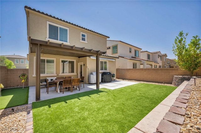 8055 Tank Loop St, Las Vegas, NV 89166 - rear view of house with stucco siding, a patio, and a tiled roof