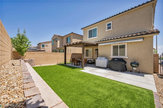 8055 Tank Loop St, Las Vegas, NV 89166 - back of property featuring a patio area, stucco siding, and a tile roof