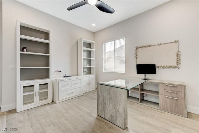 2168 Big Bar Dr, Henderson, NV 89052 - unfurnished office with ceiling fan, light wood-style flooring, and baseboards