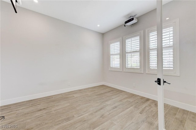 2168 Big Bar Dr, Henderson, NV 89052 - empty room with light wood finished floors, baseboards, and recessed lighting