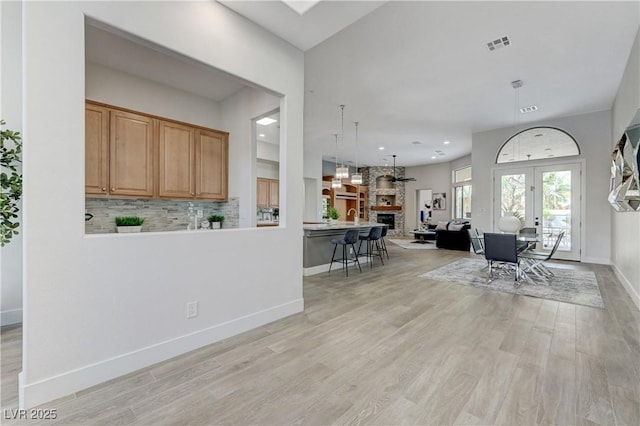 2168 Big Bar Dr, Henderson, NV 89052 - living area with light wood-style flooring, baseboards, french doors, and recessed lighting
