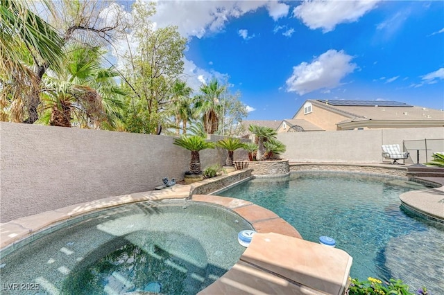 2168 Big Bar Dr, Henderson, NV 89052 - view of swimming pool featuring a fenced backyard and a pool with connected hot tub