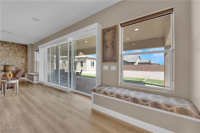 7258 W Le Baron Ave, Las Vegas, NV 89178 - living area featuring plenty of natural light, baseboards, and wood finished floors