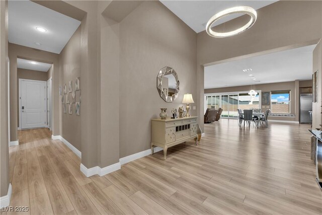 7258 W Le Baron Ave, Las Vegas, NV 89178 - hall with light wood-style flooring and baseboards