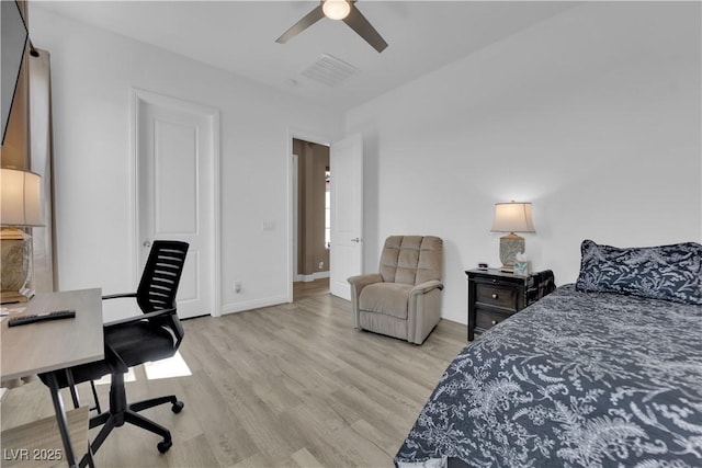 7258 W Le Baron Ave, Las Vegas, NV 89178 - bedroom featuring light wood-style floors, a desk, baseboards, and a ceiling fan