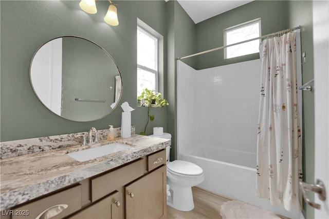 7258 W Le Baron Ave, Las Vegas, NV 89178 - full bathroom featuring vanity, toilet, shower / bath combo with shower curtain, and wood finished floors