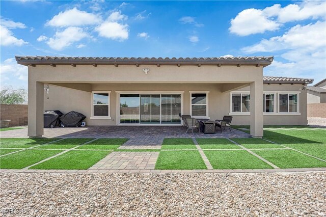 7258 W Le Baron Ave, Las Vegas, NV 89178 - back of property with a patio and stucco siding