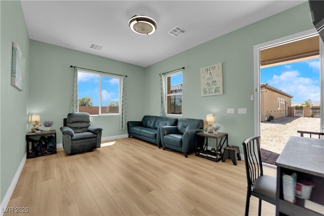 7258 W Le Baron Ave, Las Vegas, NV 89178 - living area featuring light wood-style floors and baseboards