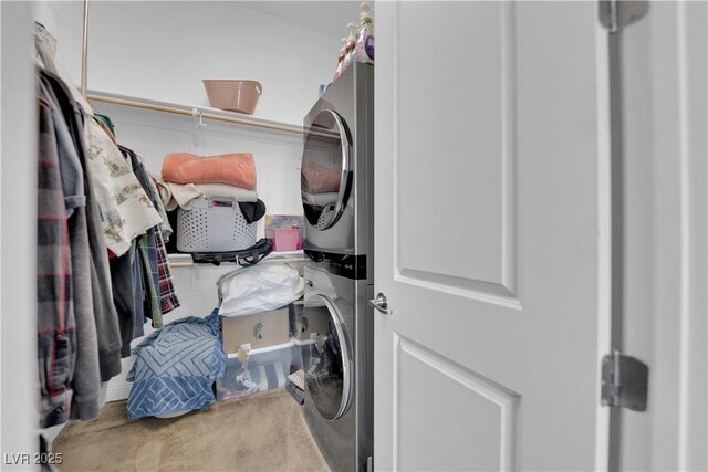 7258 W Le Baron Ave, Las Vegas, NV 89178 - walk in closet featuring stacked washer / dryer