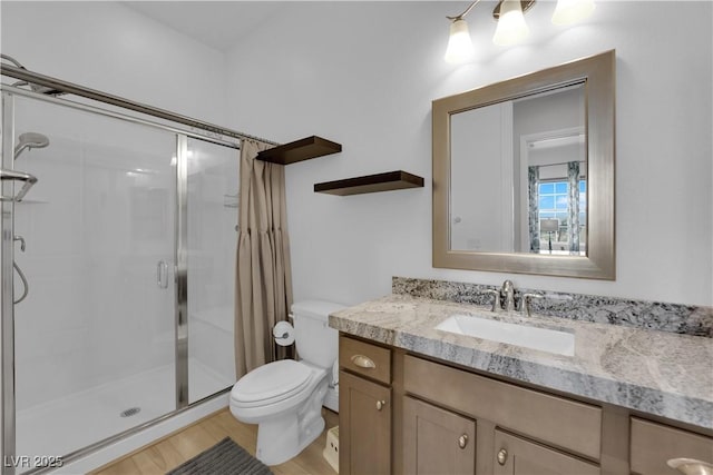 7258 W Le Baron Ave, Las Vegas, NV 89178 - bathroom with a shower stall, toilet, and vanity