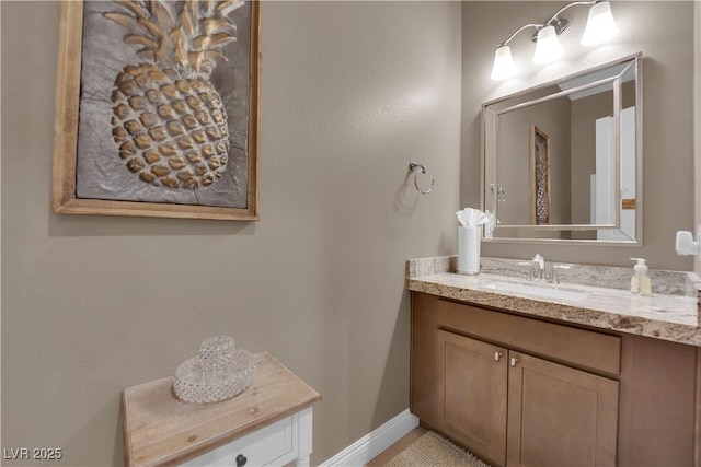 7258 W Le Baron Ave, Las Vegas, NV 89178 - bathroom featuring vanity and baseboards