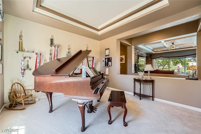 4719 Riva De Romanza St, Las Vegas, NV 89135 - living area with crown molding, carpet floors, a tray ceiling, and ceiling fan