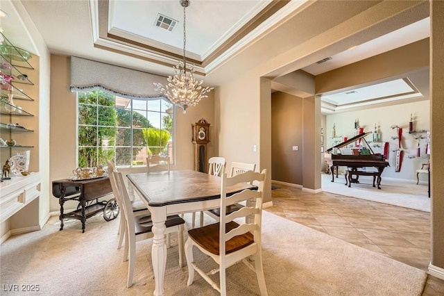 4719 Riva De Romanza St, Las Vegas, NV 89135 - dining room featuring a tray ceiling, ornamental molding, a chandelier, light carpet, and light tile patterned flooring