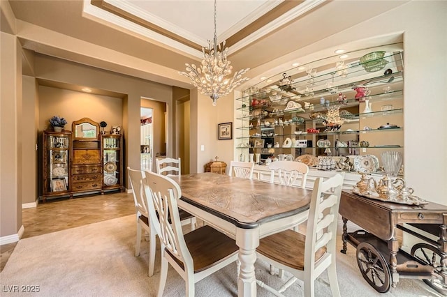 4719 Riva De Romanza St, Las Vegas, NV 89135 - dining area with crown molding, a raised ceiling, and a chandelier