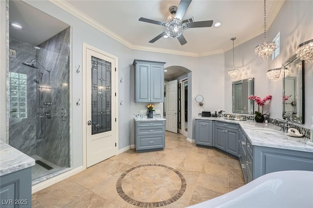 4719 Riva De Romanza St, Las Vegas, NV 89135 - full bath featuring a shower stall, vanity, a ceiling fan, crown molding, and a freestanding tub
