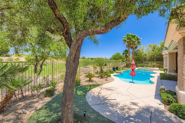 4719 Riva De Romanza St, Las Vegas, NV 89135 - view of swimming pool featuring a fenced backyard, a patio area, and a pool with connected hot tub