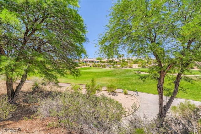 4719 Riva De Romanza St, Las Vegas, NV 89135 - view of community featuring a yard and view of golf course