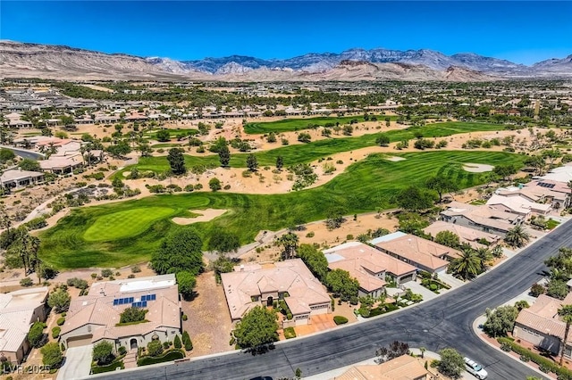 4719 Riva De Romanza St, Las Vegas, NV 89135 - aerial perspective of suburban area featuring a mountainous background and a golf club