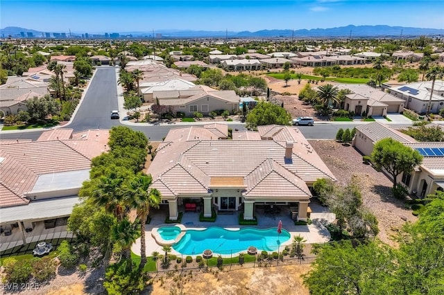 4719 Riva De Romanza St, Las Vegas, NV 89135 - aerial view of residential area with a pool and mountains
