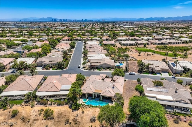 4719 Riva De Romanza St, Las Vegas, NV 89135 - aerial view of residential area with a mountain backdrop and a pool