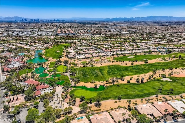 4719 Riva De Romanza St, Las Vegas, NV 89135 - aerial view of property and surrounding area with a local golf course, a water and mountain view, and nearby suburban area