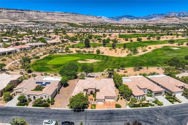 4719 Riva De Romanza St, Las Vegas, NV 89135 - aerial perspective of suburban area featuring a local golf course and a mountainous background