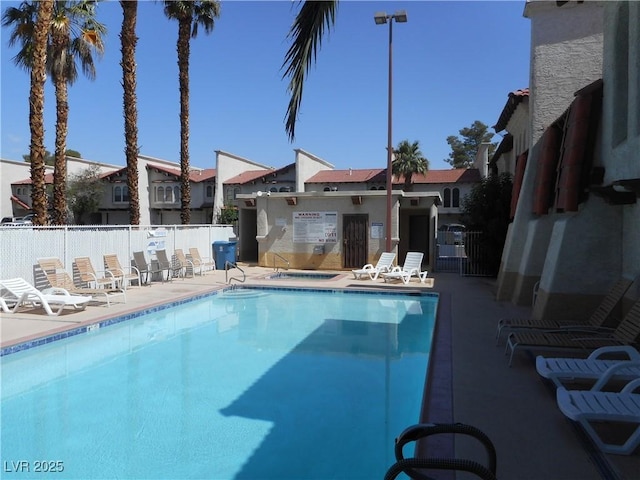 5006 Schumann Dr, Las Vegas, NV 89146 - community pool with a hot tub and a patio area