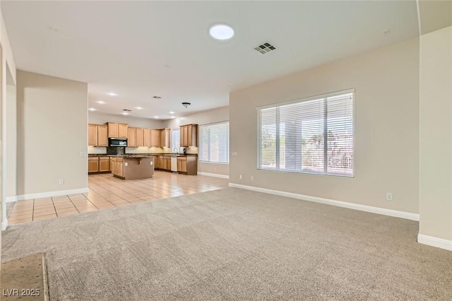 8305 Chapelle Ct, Las Vegas, NV 89131 - unfurnished living room with light carpet, baseboards, light tile patterned floors, and recessed lighting