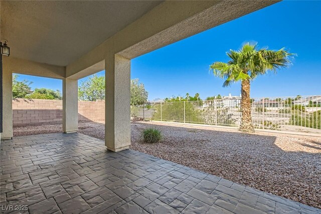 8305 Chapelle Ct, Las Vegas, NV 89131 - fenced backyard featuring a patio