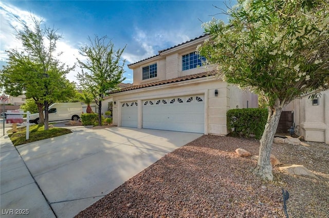 9772 Galahad Point Ct, Las Vegas, NV 89147 - view of front facade with driveway and a tiled roof