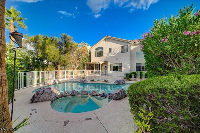 9772 Galahad Point Ct, Las Vegas, NV 89147 - view of swimming pool featuring a patio area, a pergola, and a pool with connected hot tub