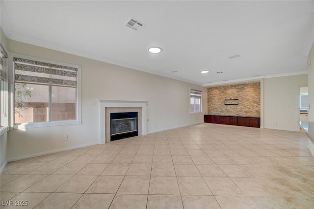 9772 Galahad Point Ct, Las Vegas, NV 89147 - unfurnished living room with a tile fireplace, crown molding, light tile patterned floors, baseboards, and recessed lighting