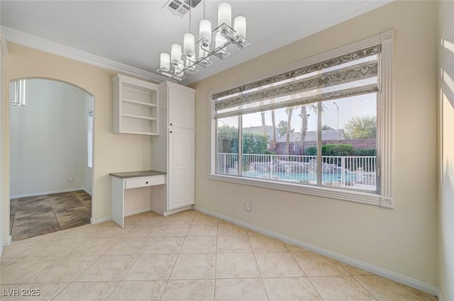 9772 Galahad Point Ct, Las Vegas, NV 89147 - unfurnished dining area featuring arched walkways, crown molding, baseboards, and light tile patterned floors