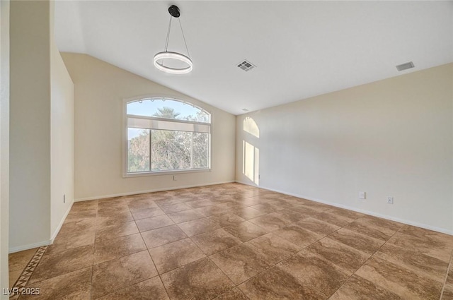 9772 Galahad Point Ct, Las Vegas, NV 89147 - spare room featuring vaulted ceiling and baseboards