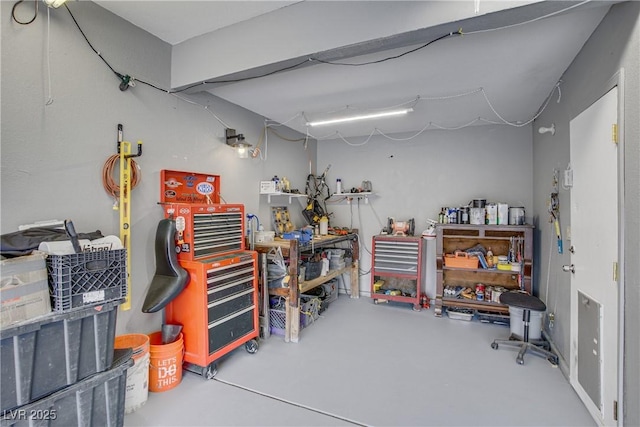 7621 Hackensack Ct, Las Vegas, NV 89128 - garage featuring a workshop area