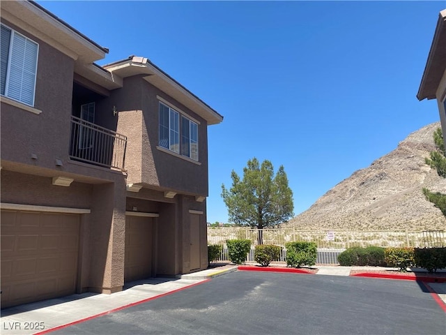 10190 Deerfield Beach Ave Unit 202, Las Vegas, NV 89129 - view of asphalt road featuring a mountain view