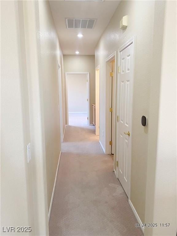 10190 Deerfield Beach Ave Unit 202, Las Vegas, NV 89129 - hall with light carpet and baseboards